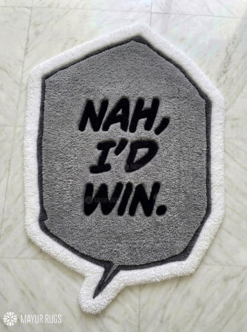 Nah I'd Win motivational quote hand tufted speech bubble rug for office and workspace decor by Mayur Rugs