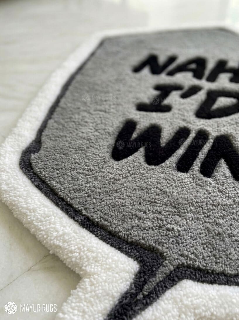 Nah I'd Win motivational quote hand tufted speech bubble rug for office and workspace decor by Mayur Rugs