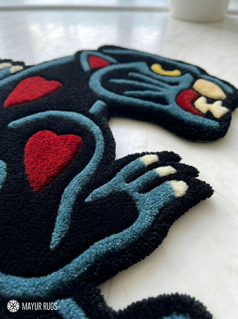 Black Panther tattoo style hand tufted area rug with red heart details handmade by Mayur Rugs