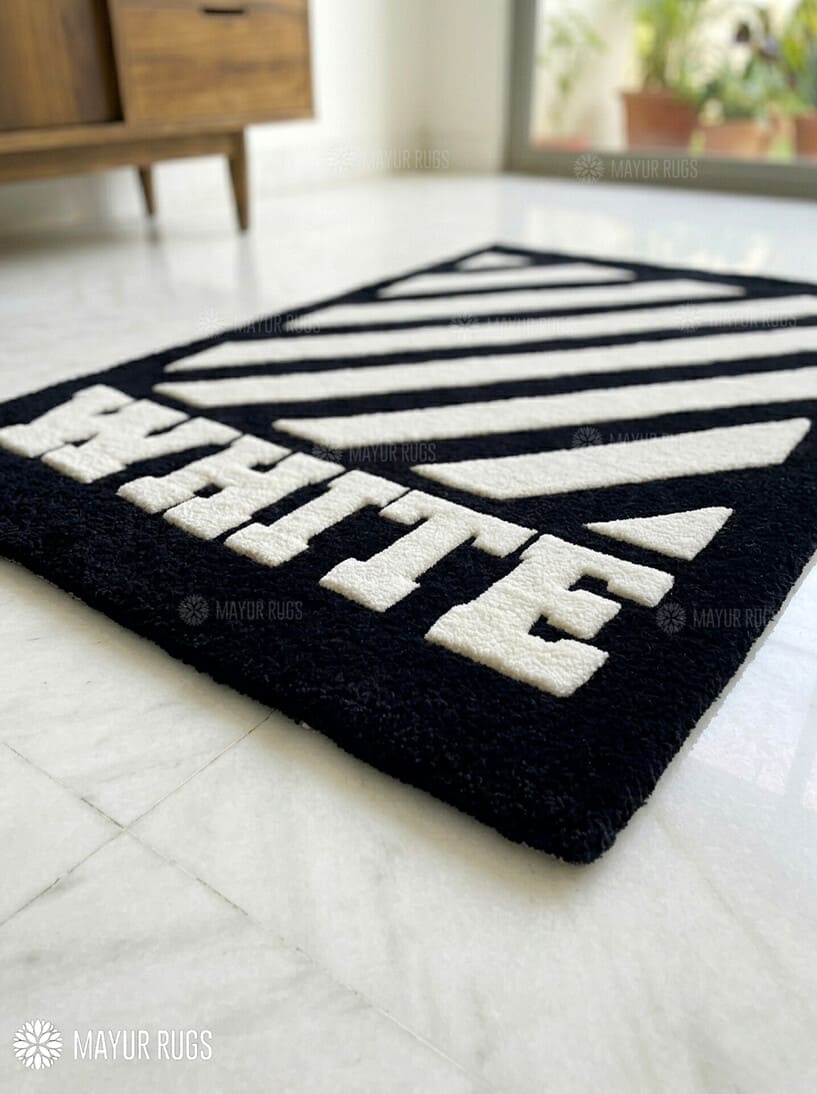White stripe graphic hand tufted wool rug featuring bold monochrome geometric artwork by Mayur Rugs.
