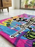 Inspired Monopoly money jet hand tufted wool area rug featuring luxury pop art, private jet, and graffiti-inspired artwork by Mayur Rugs.