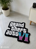 Grand Theft Auto VI hand-tufted logo rug handmade in India by Mayur Rugs featuring bold gaming typography and pastel VI design.