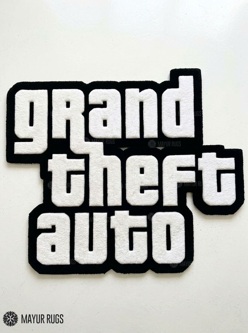 Grand Theft Auto logo hand tufted custom wool rug featuring fan-inspired gaming typography by Mayur Rugs.