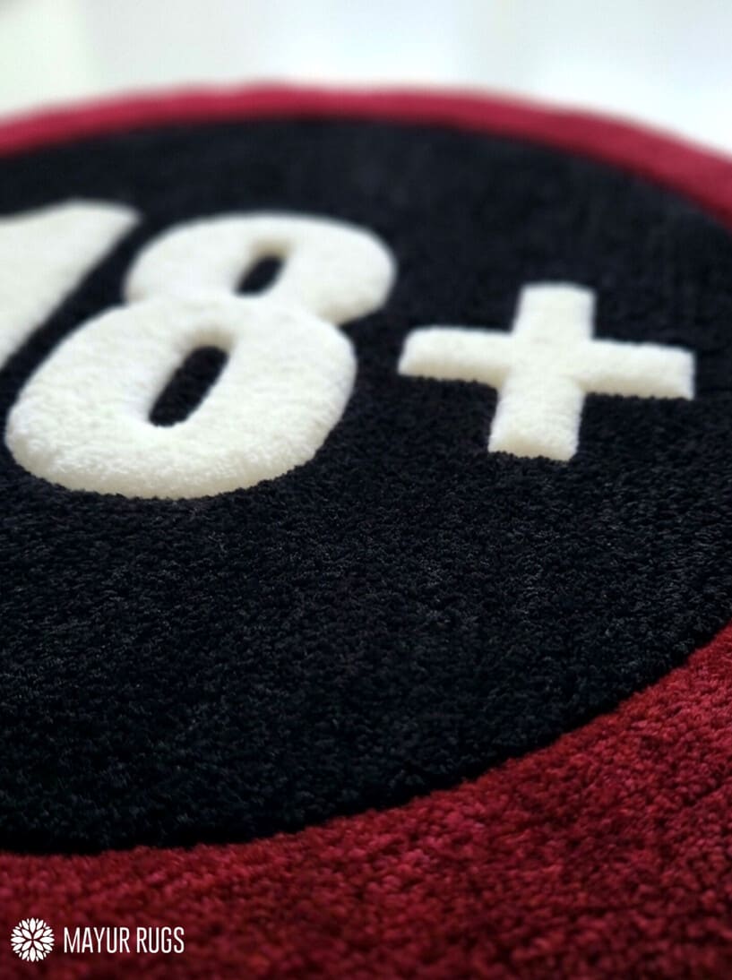 18+ warning sign hand-tufted rug handmade in India by Mayur Rugs featuring a bold circular graphic design for gaming rooms and modern décor.