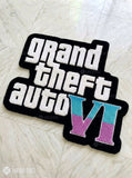 Grand Theft Auto VI hand-tufted logo rug handmade in India by Mayur Rugs featuring bold gaming typography and pastel VI design.