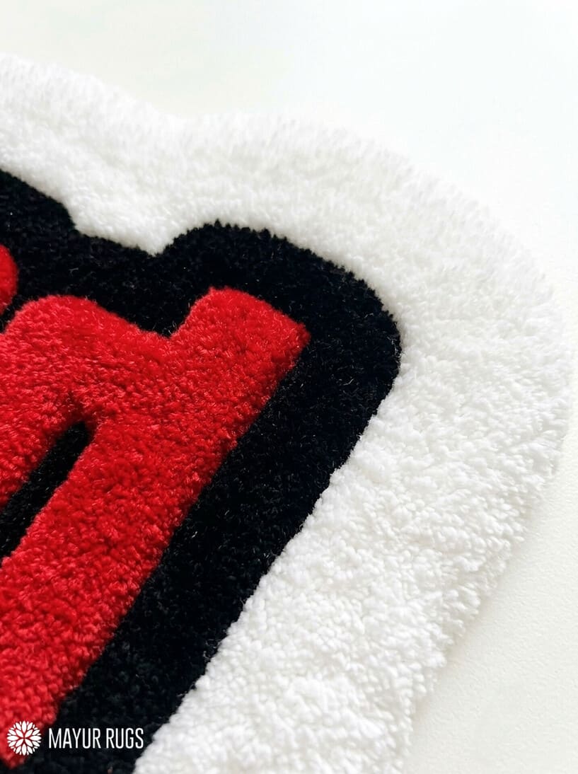 Wasted hand-tufted statement rug handmade in India by Mayur Rugs featuring bold gaming-inspired typography in red, black, and white.