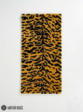 Tiger print hand-tufted runner rug featuring a bold black and golden stripe pattern, handmade from premium New Zealand wool by Mayur Rugs.