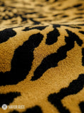 Tiger print hand-tufted runner rug featuring a bold black and golden stripe pattern, handmade from premium New Zealand wool by Mayur Rugs.