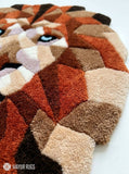 Geometric lion head hand-tufted rug handmade in India by Mayur Rugs featuring a modern low-poly wildlife design with earthy tones and premium wool craftsmanship.