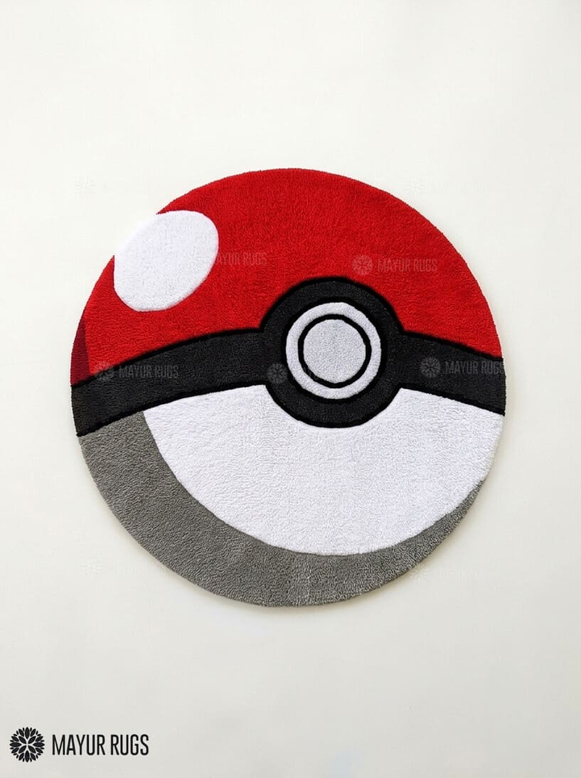 Poké Ball inspired hand-tufted custom wool rug featuring the iconic red, white, black, and grey Pokémon-inspired design by Mayur Rugs.