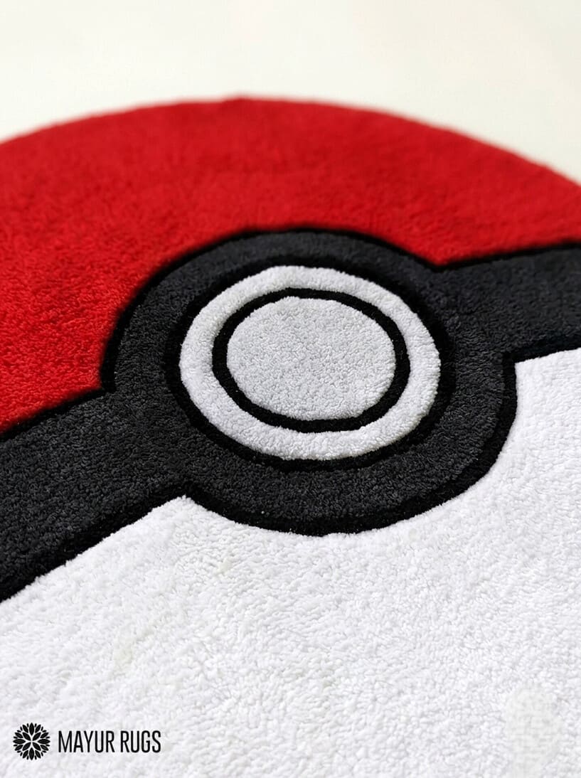 Poké Ball inspired hand-tufted custom wool rug featuring the iconic red, white, black, and grey Pokémon-inspired design by Mayur Rugs.