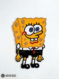 SpongeBob SquarePants hand-tufted custom wool rug featuring a colorful character design with yellow body, white shirt, red tie, and black pants by Mayur Rugs.