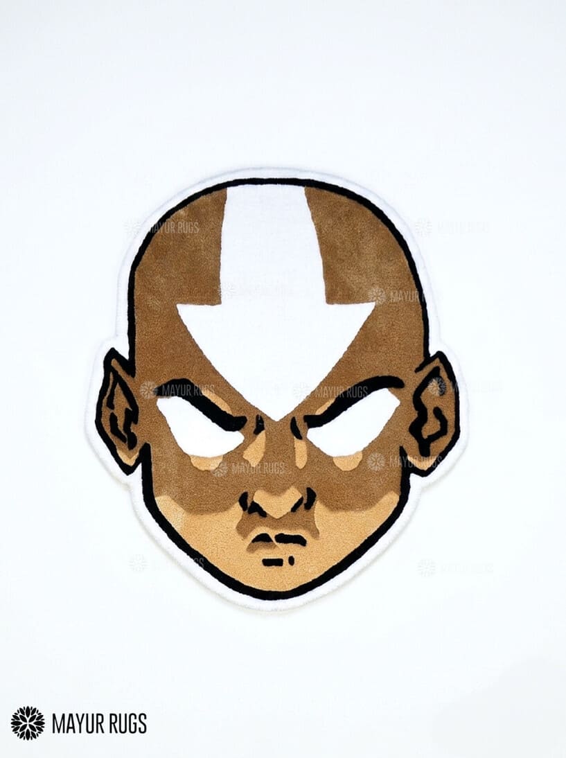Aang inspired Avatar hand-tufted custom wool rug featuring a bald anime character with a white forehead arrow, expressive eyes, and detailed tan and brown artwork by Mayur Rugs.