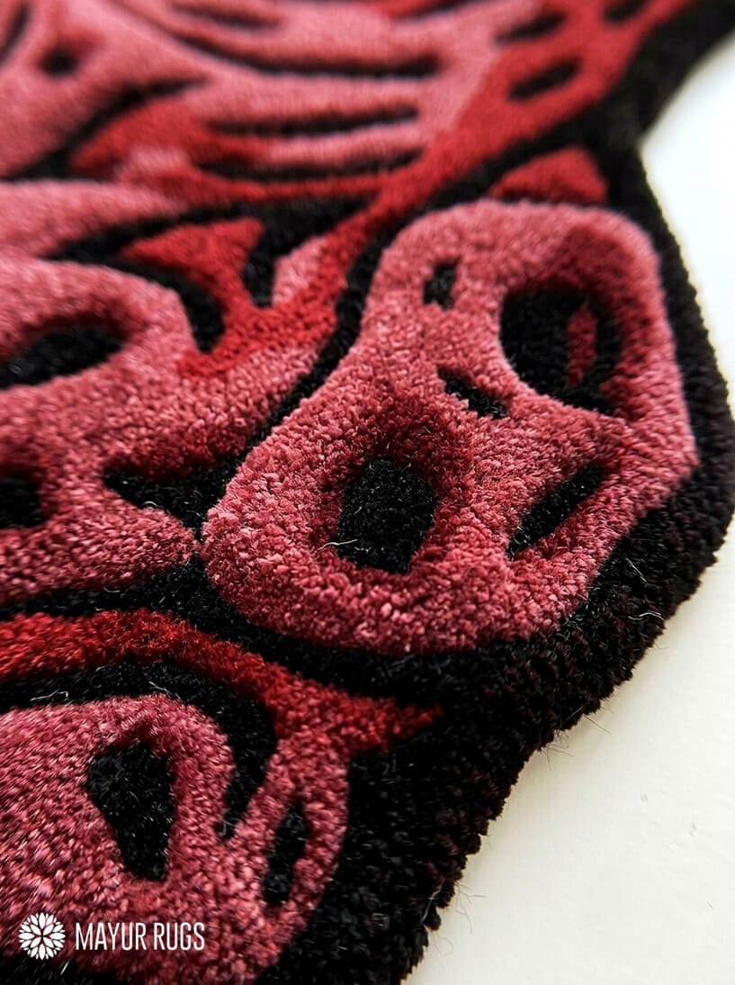 Sukuna cursed finger hand-tufted custom wool rug featuring dark red, black, and cream Jujutsu Kaisen anime artwork by Mayur Rugs.
