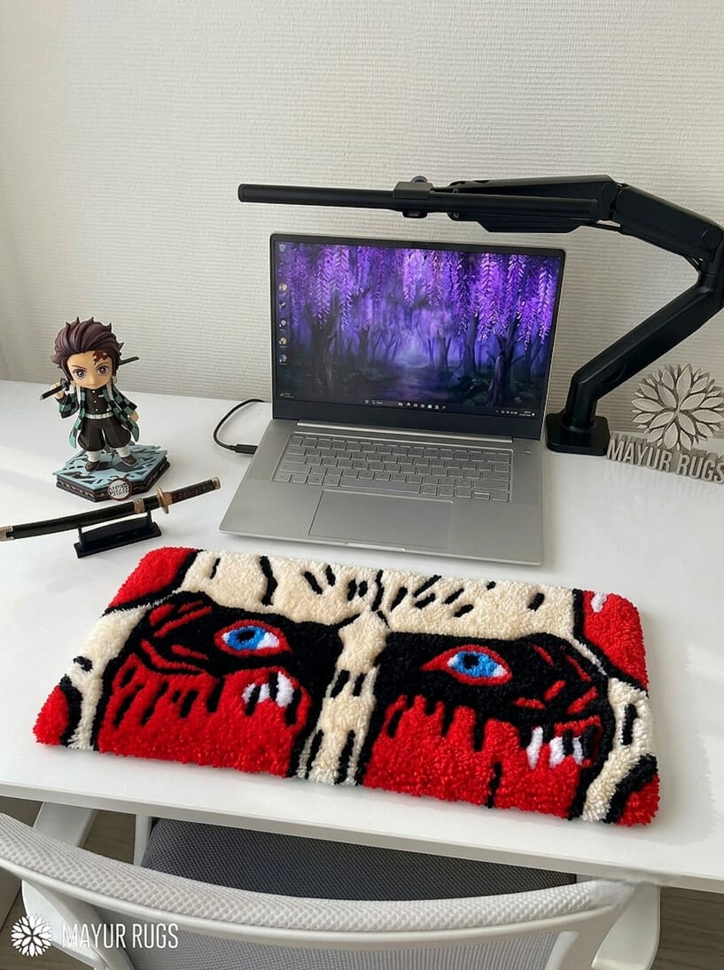 Attack on Titan inspired hand-tufted keyboard rug featuring dramatic anime character artwork in red, black, cream, and blue for gaming desk and anime room décor by Mayur Rugs.