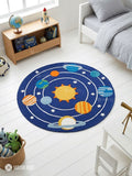 Kids solar system hand-tufted wool area rug featuring a colorful sun, planets, orbital rings, and stars on a deep blue space-themed background by Mayur Rugs.