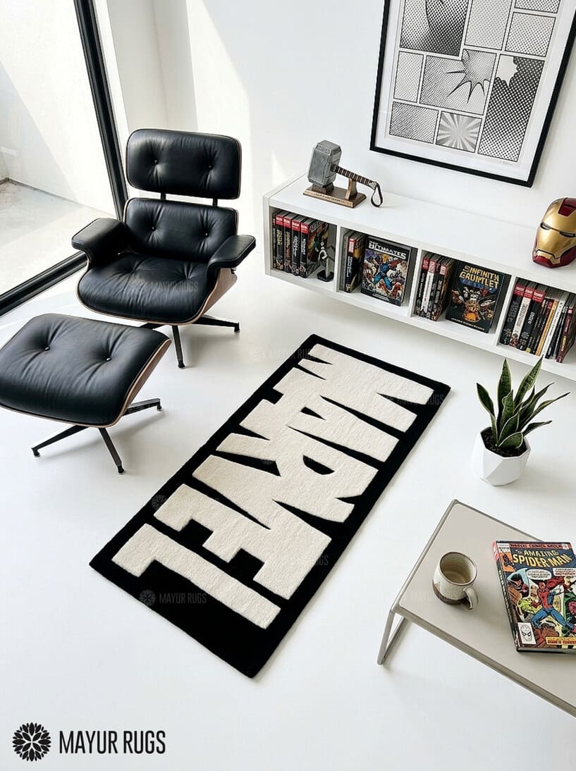 Marvel inspired hand-tufted wool area rug featuring oversized cream-white comic book lettering on a deep red background for superhero and pop-culture décor by Mayur Rugs.