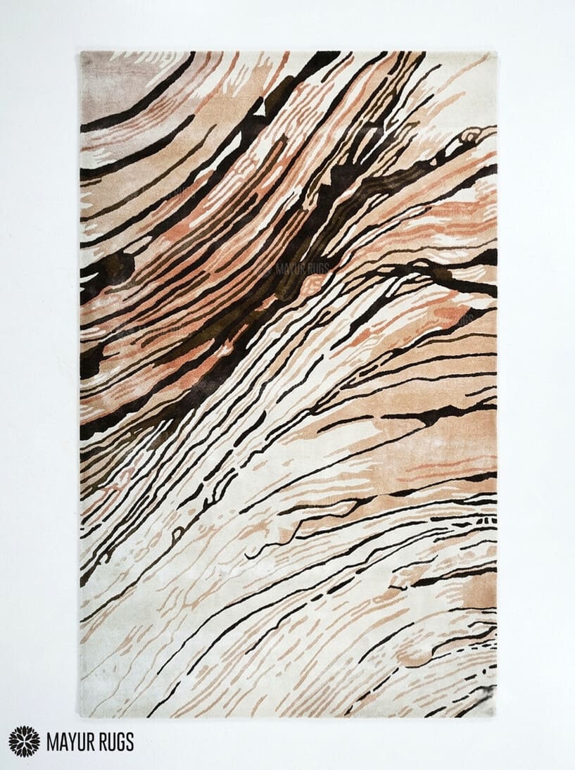 Modern flow silk-inspired hand-tufted wool area rug featuring flowing black, cream, beige, taupe, and soft peach organic lines in a contemporary abstract luxury design by Mayur Rugs.
