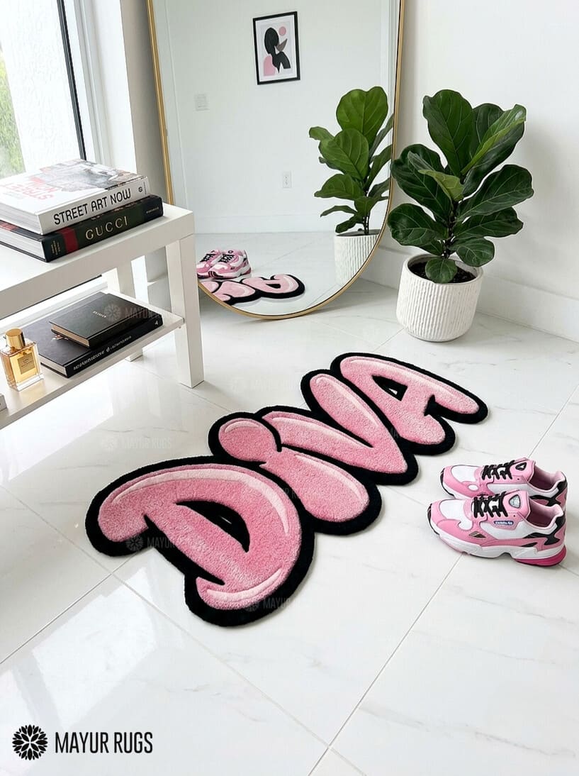 DIVA pink Y2K hand-tufted custom wool rug featuring oversized bubble-style pink lettering with lighter highlights and a bold black outline by Mayur Rugs.