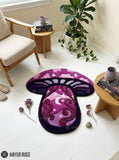 Pink and purple hand-tufted mushroom rug featuring clouds, stars, a crescent moon, and swirling fantasy patterns by Mayur Rugs.