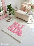 Square hand-tufted rug with bold pink “HOT GIRL CLUB” lettering and a star accent on an ivory-white background by Mayur Rugs.
