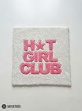 Square hand-tufted rug with bold pink “HOT GIRL CLUB” lettering and a star accent on an ivory-white background by Mayur Rugs.