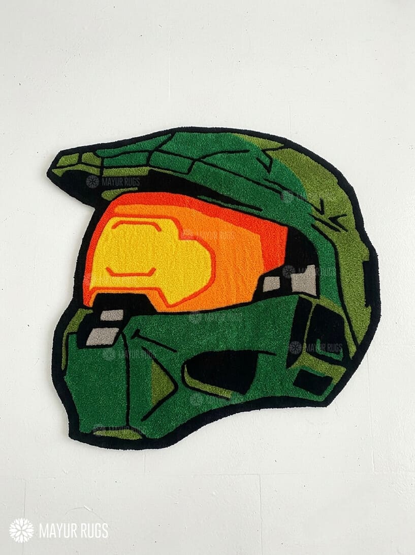 Custom-shaped green sci-fi Spartan helmet rug featuring an orange-gold visor, black outlines, and angular armor details inspired by Halo's Master Chief.