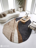 Modern abstract rug with an irregular organic shape, charcoal grey sections, taupe and brown curves, ivory bands, and fine linear detailing by Mayur Rugs.