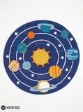 Kids solar system hand-tufted wool area rug featuring a colorful sun, planets, orbital rings, and stars on a deep blue space-themed background by Mayur Rugs.