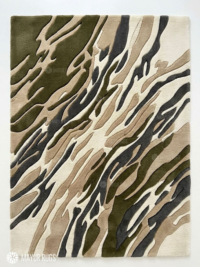 Rectangular Sandstorm Camo abstract rug in olive green, beige, charcoal grey, and ivory with a flowing camouflage-inspired pattern by Mayur Rugs.