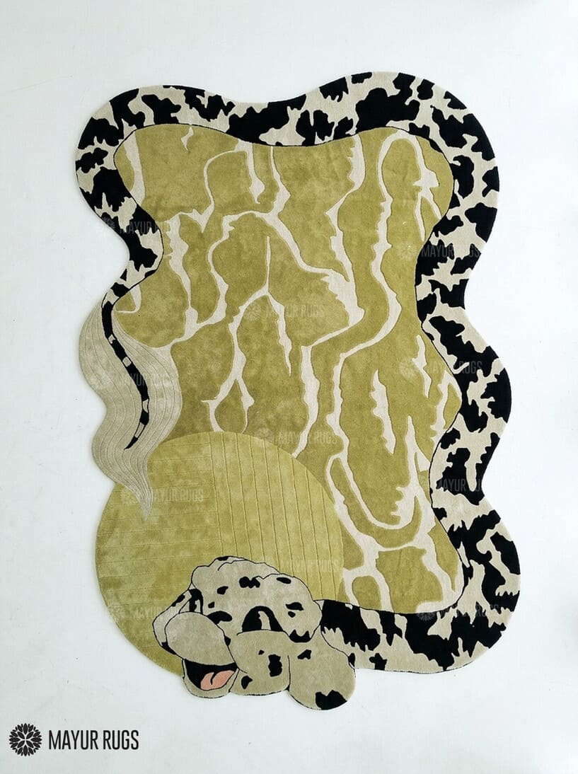 Shop the Python Snake Hand-Tufted Irregular Area Rug by Mayur Rugs. Handmade with premium New Zealand wool featuring a flowing reptile-inspired design, 16–20mm plush pile, custom sizing, and export-quality backing.