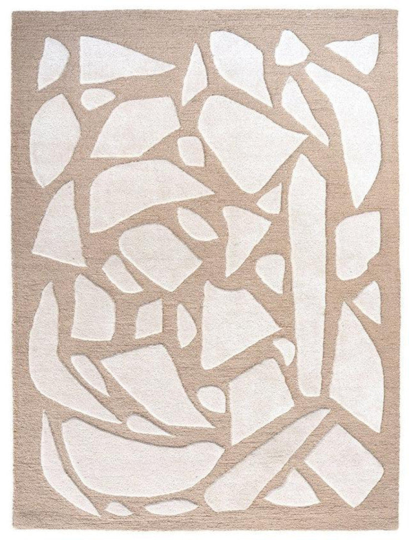 Beige and white abstract patterned rug